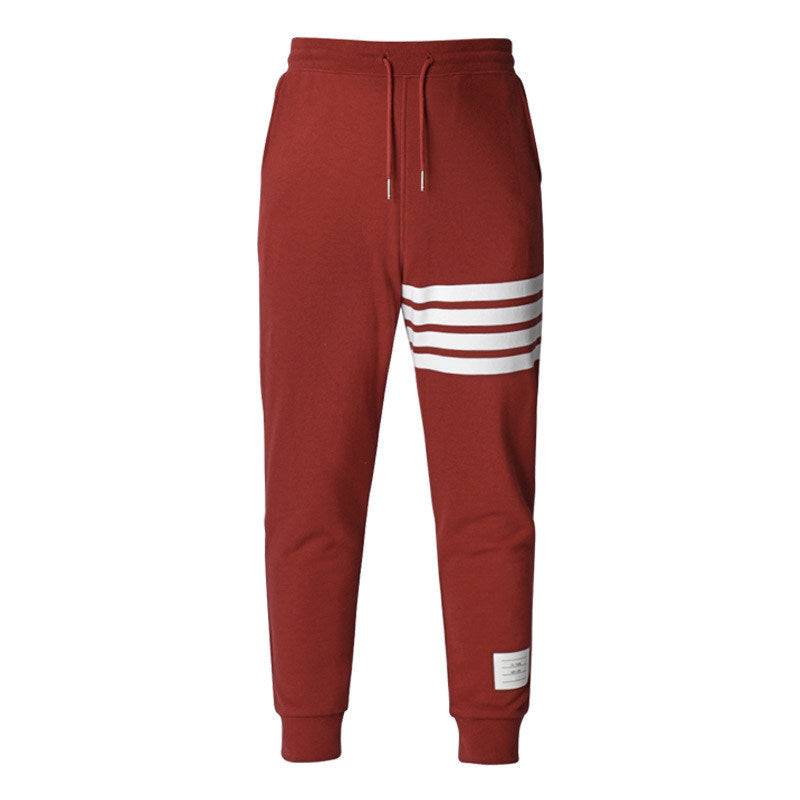 Thom Browne Style Unisex red sweatpants with Signature Four-Bar Detail